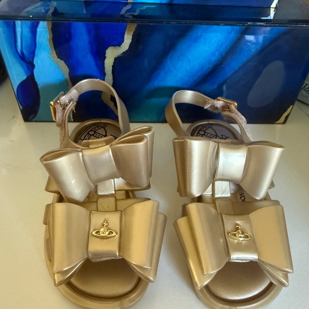Mini Melissa Gold Sandals with Bow Accent